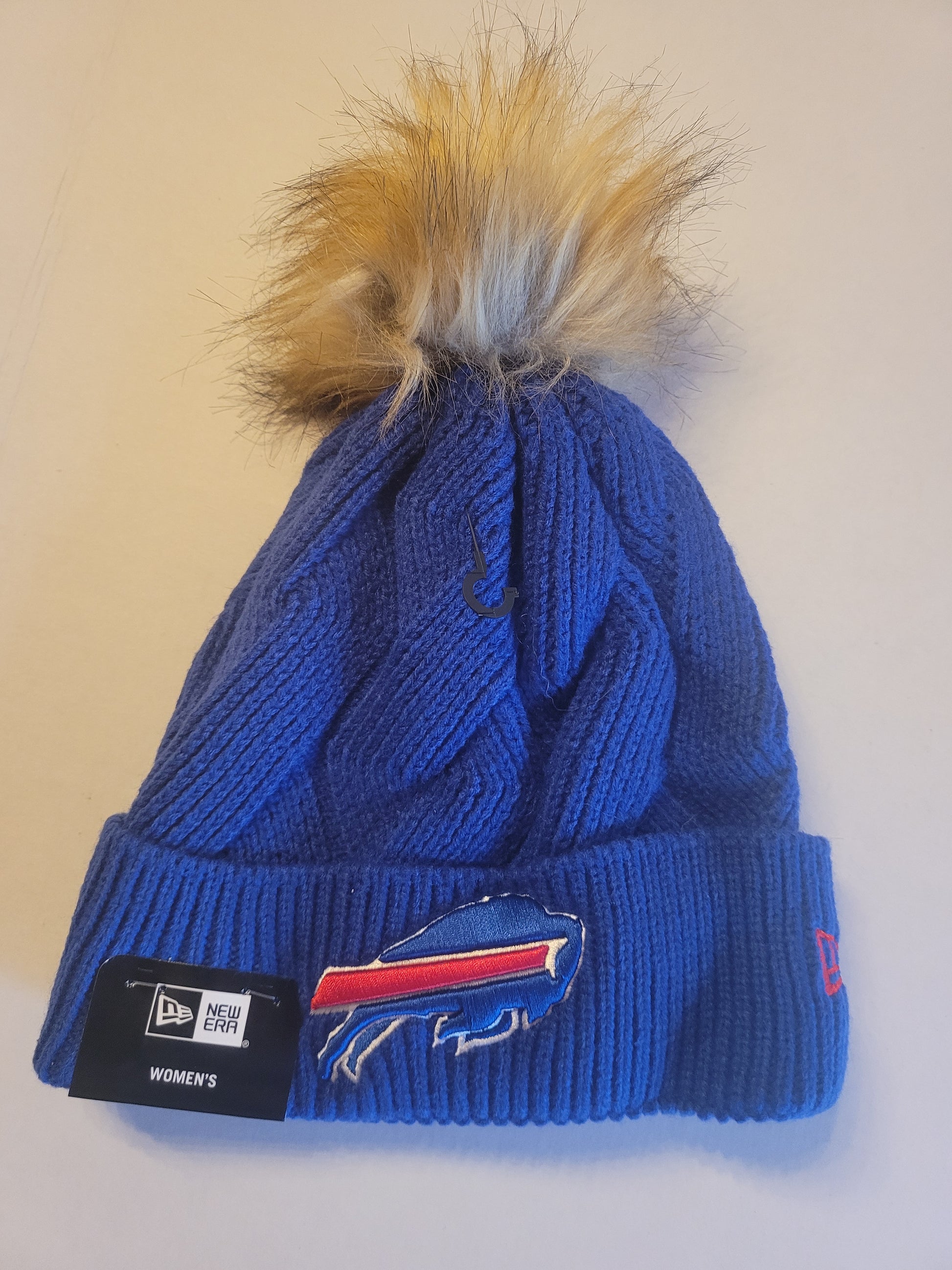 Buffalo Bills New Era Woman's Royal Snowy Cuffed Knit Hat with Pom - Eclectic-Sports
